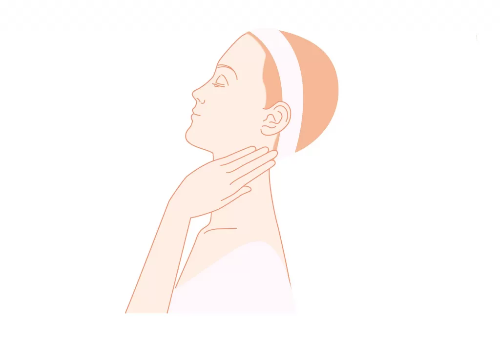 耳下腺リンパ節を人差し指と中指の腹で上下にさするように押す